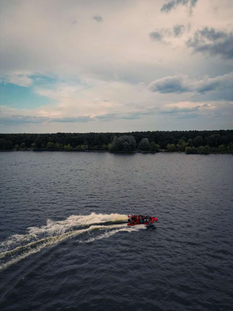 Red Motorboat on Lake