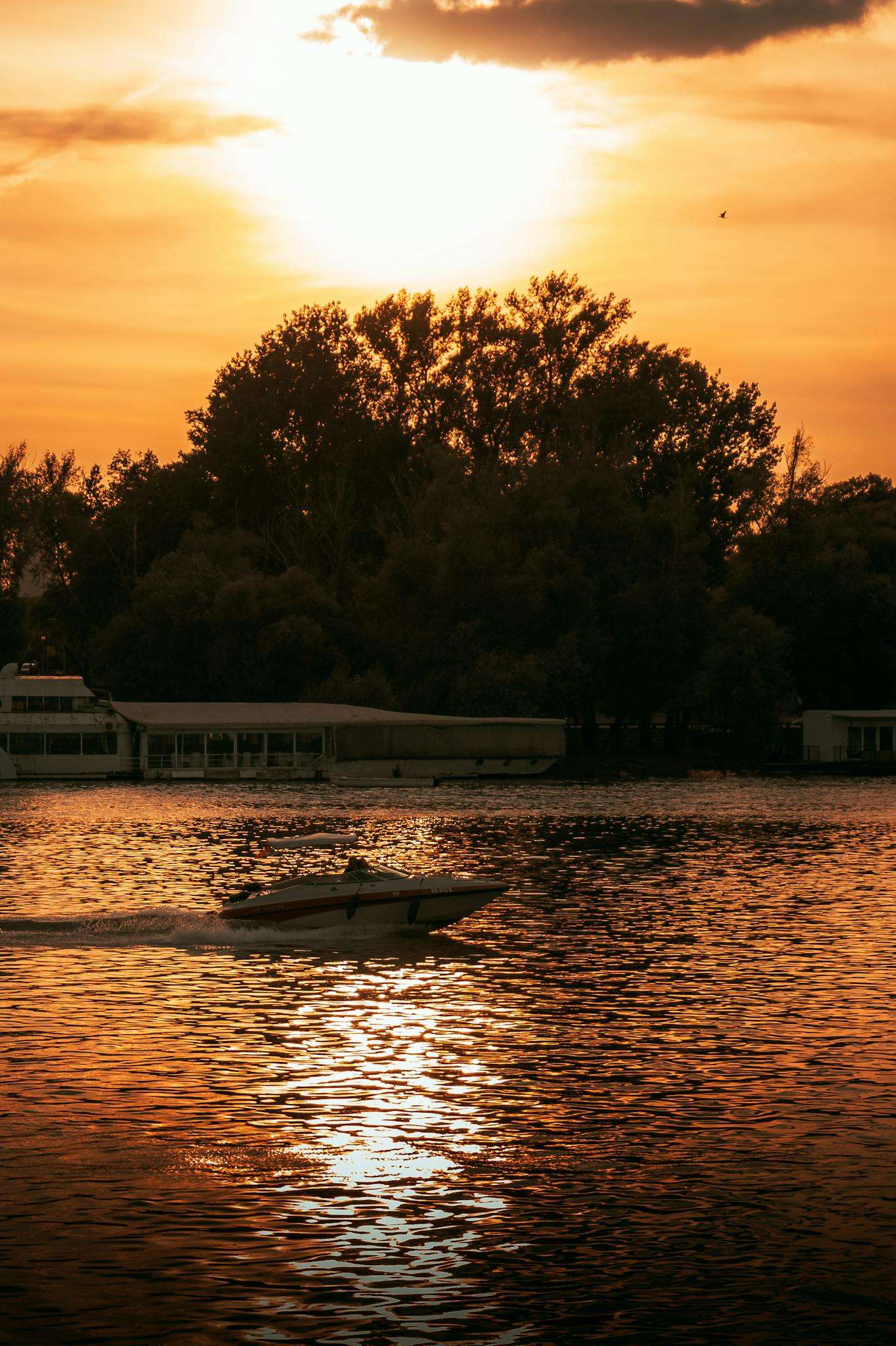 Speedboat on the Lake during Sunset